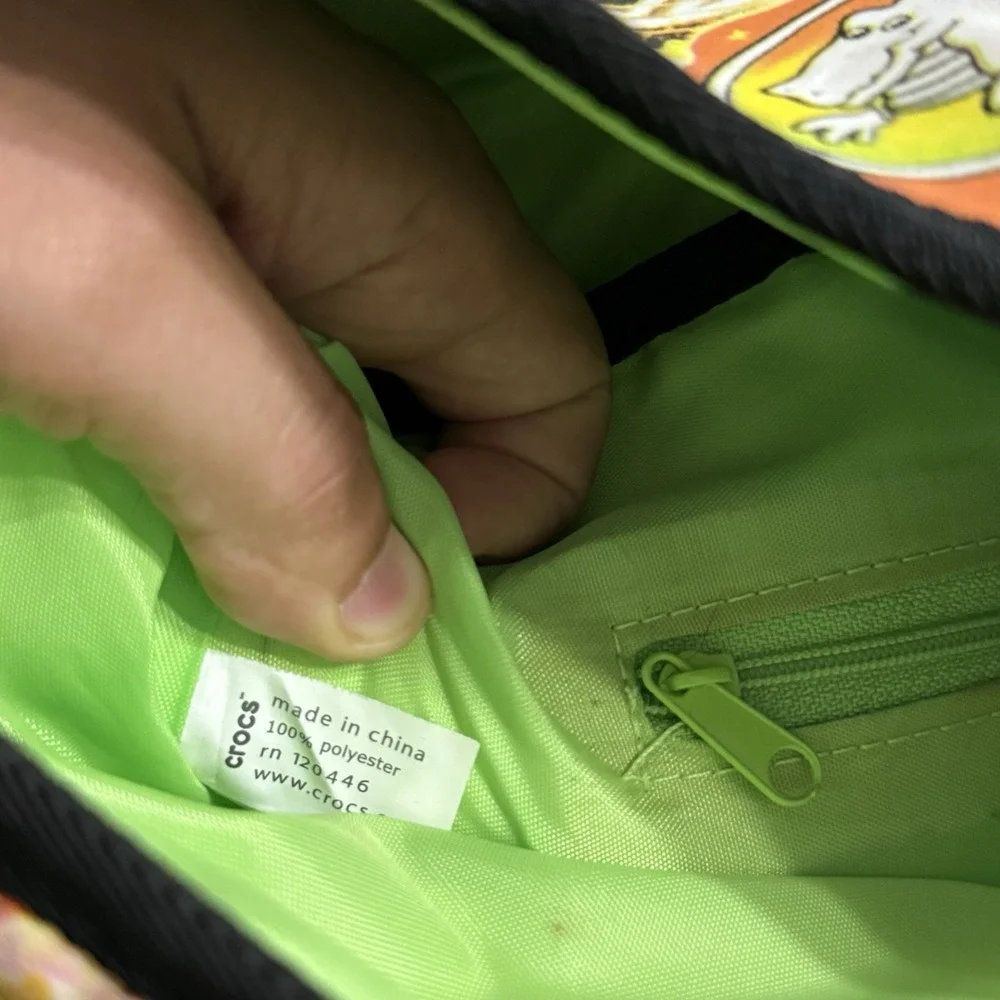 Crocs Graffiti Dinosaur Messenger Bag Adult Lime Green Interior